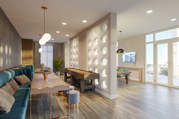 Gameroom with pool table and seating area in the resident entertainment clubroom